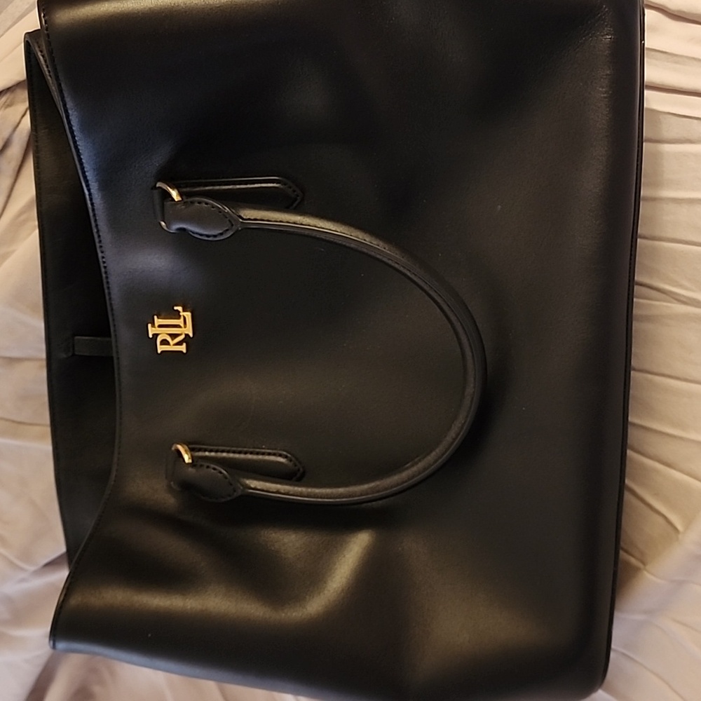 Ralph Lauren navy blue tote! Roomy has a shoulder strap holds lots of thing!